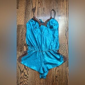 Frederick’s woman’s  blue polka dot lace romper